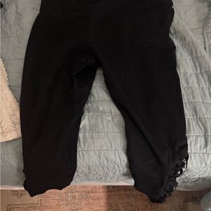 Fabletics PLUS Black Leggings with Crisscross Hem